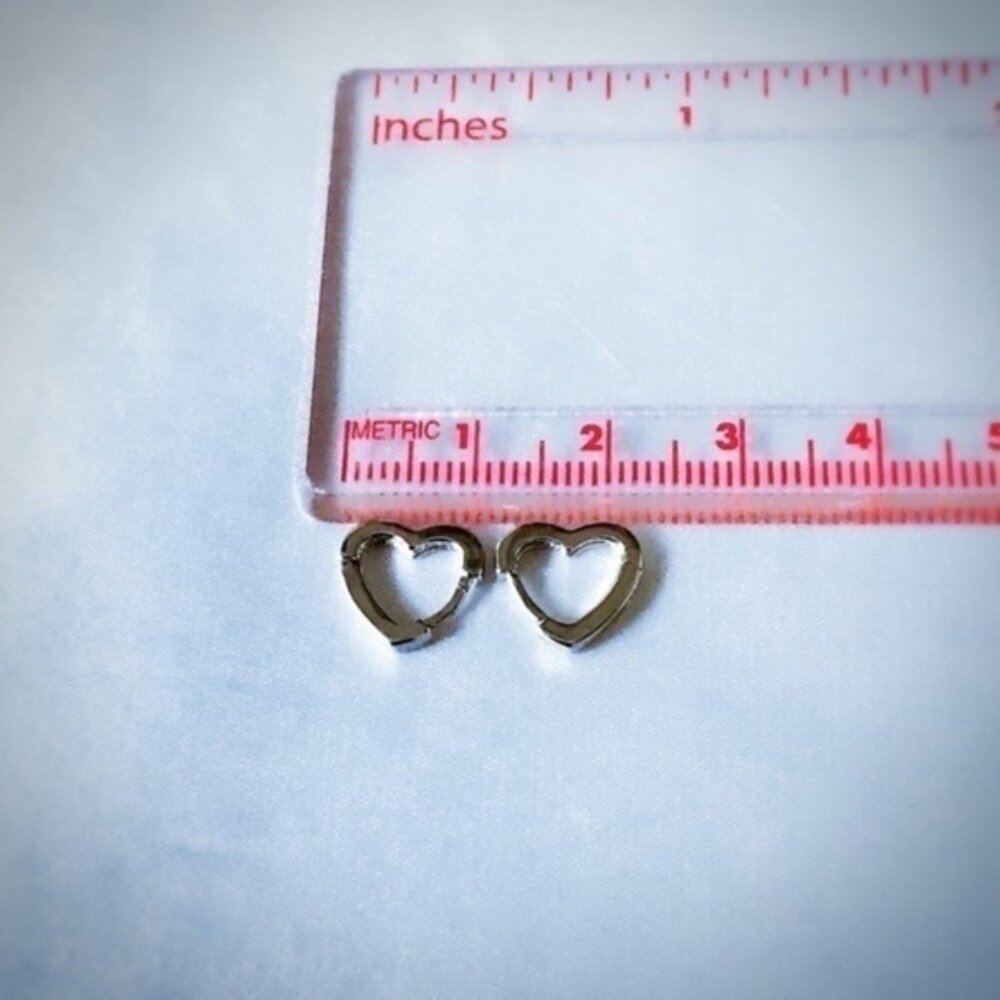 Sterling silver heart shaped hoop earrings